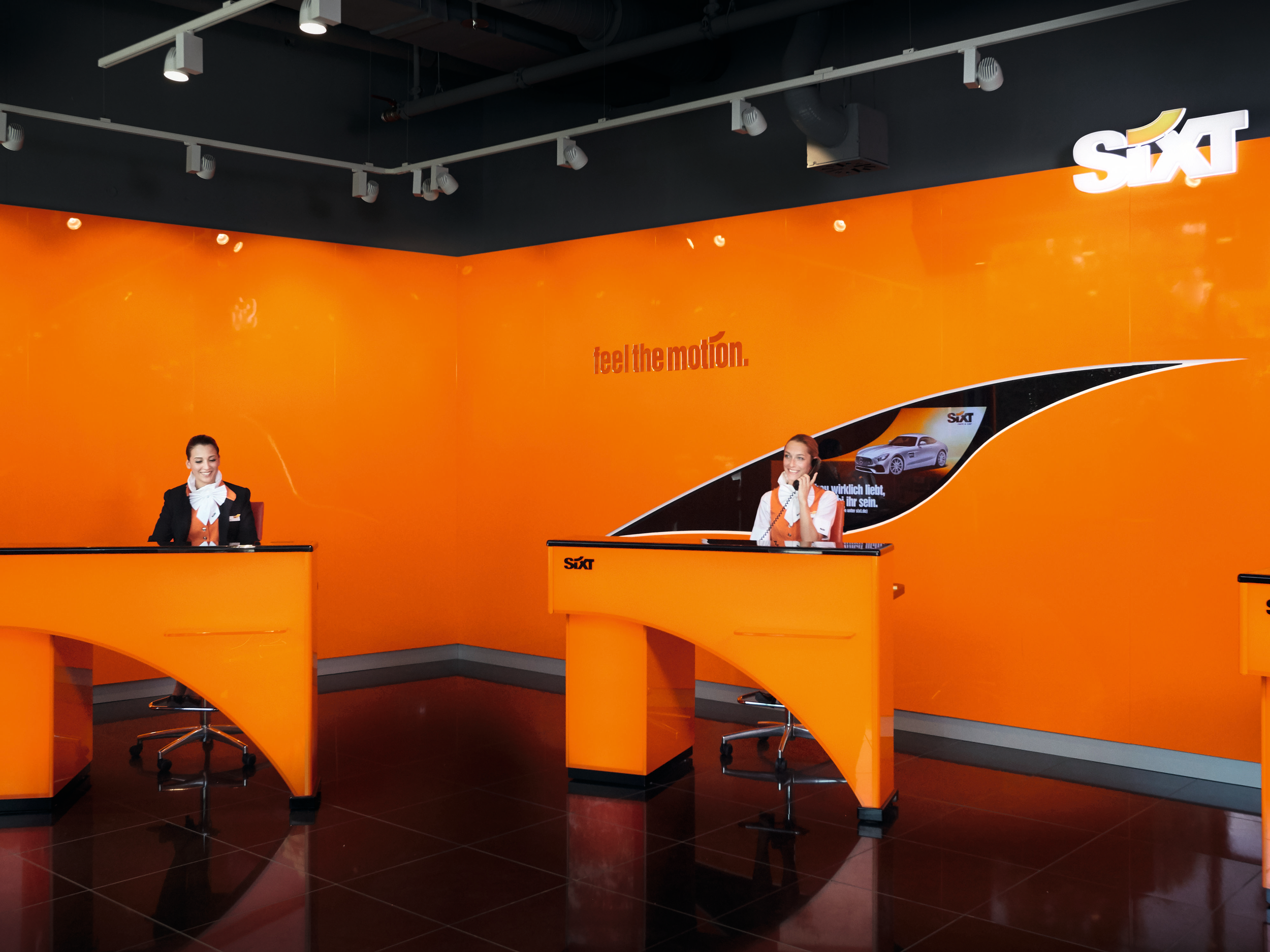 Typische Filiale im auffälligen Orange. Bild: Sixt SE