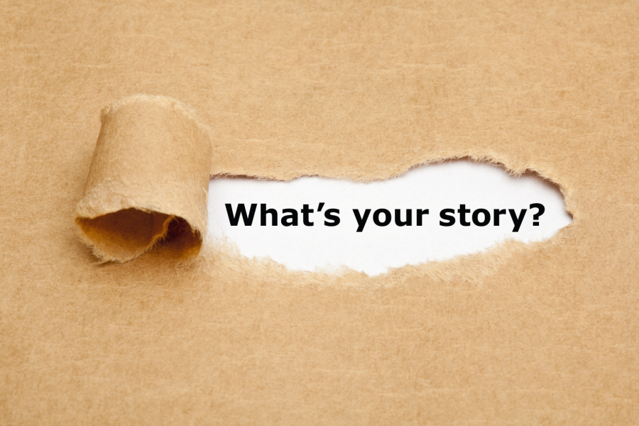 The text What's Your Story appearing behind torn brown paper. Bild: Ivelin Radkov/stock.adobe.com