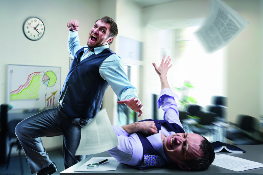 Two agressive businessmen fighting in the office Bild: Nomad_Soul/stock.adobe.com