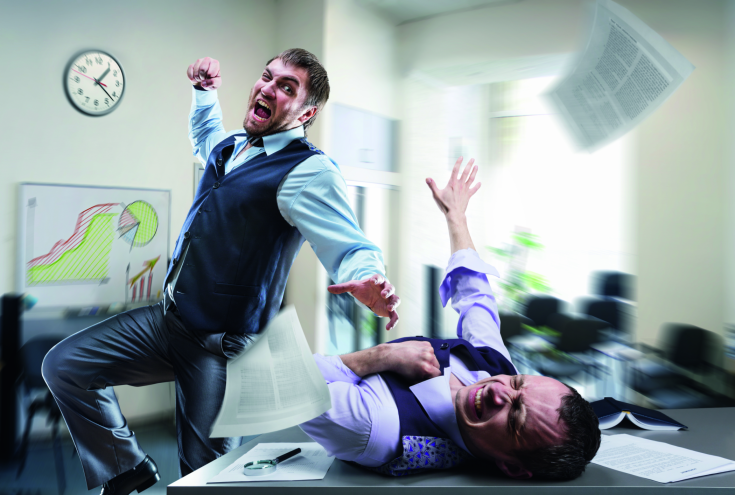 Two agressive businessmen fighting in the office Bild: Nomad_Soul/stock.adobe.com